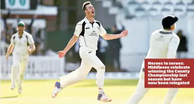  ??  ?? Heroes to zeroes: Middlesex celebrate winning the County Championsh­ip last season but have now been relegated