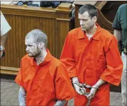  ?? BOB ANDRES/AJC 2017 ?? Ricky Dubose (front) and Donnie Russsell Rowe enter the Putnam County Courthouse in Eatonton in June 2017 after leading authoritie­s on a multiday manhunt after two prison guards were killed.