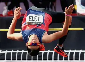  ??  ?? I feel good: Norshafiee Mohd Shah of Johor clearing the bar to win the gold medal in the high jump at the Perak Stadium yesterday.