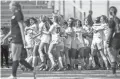  ?? SEAN LOGAN/THE REPUBLIC ?? Xavier celebrates after defeating Perry for the 6A girls soccer state championsh­ip on Saturday at Campo Verde in Gilbert. Xavier won, 1-0.