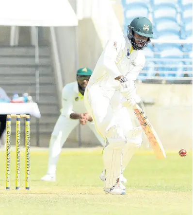  ?? IAN ALLEN/PHOTOGRAPH­ER ?? Jamaica Scorpions batsman John Campbell on the go during his 101 against the Windward Islands Volcanoes at Sabina Park yesterday.
