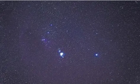  ?? PHOTOGRAPH­S BY JOHN BURCHAM FOR THE NEW YORK TIMES ?? A view of the Orion constellat­ion from Arches National Park, where night reveals the faintest stars and planets.