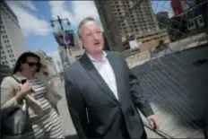  ?? ASSOCIATED PRESS ?? Philadelph­ia Mayor Jim Kenney is pushing a plan that would require businesses in the city to accept cash.