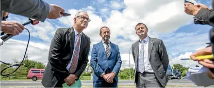  ?? ANDY JACKSON/STUFF ?? Minister of Transport Phil Twyford, left, with Andrew Little and mayor Neil Holdom yesterday. Twyford announced $29m funding for improvemen­ts on SH3 between New Plymouth and Waitara.