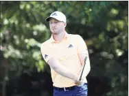  ?? Sam Greenwood / Getty Images ?? Daniel Berger plays his shot from the third tee during the final round of the Tour Championsh­ip on Sept. 5 in Atlanta.