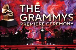  ?? CHRIS PIZZELLO — THE ASSOCIATED PRESS ?? Randy Rainbow presents an award on stage at the 65th annual Grammy Awards on Sunday in Los Angeles.