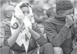  ?? Tom Reel / San Antonio Express-News ?? The end of the game is hard for Sterling senior Joshua Young to watch after the starters were taken out in the final minutes of the Raiders’ loss to Bridgeport.