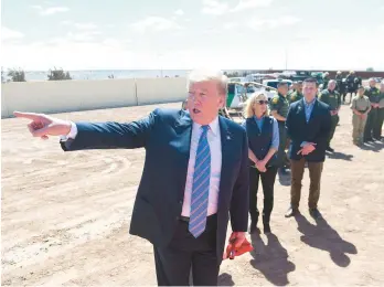  ?? SAUL LOEB/GETTY-AFP 2019 ?? President Donald Trump gestures while he takes a tour of the southern border wall between the United States and Mexico in Calexico, Calif.