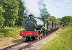  ?? JOHN FAULKNER ?? 198 Royal Engineer : The Isle of Wight Steam Railway’s ex-Army ‘Austerity’ returned to steam in July following a three-year overhaul. This picture was taken on July 6, its first day in passenger service, the 0-6-0ST having undergone a trial run with...