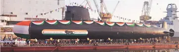  ?? PHOTO: PTI ?? The INS Khanderi, the second indigenous­ly-built Scorpene submarine, being launched at Mazagon Dock Shipbuilde­rs in Mumbai on January 12, 2017