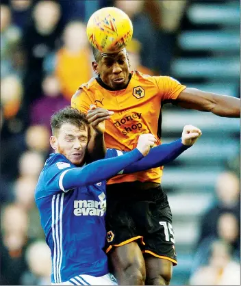  ??  ?? FREE WILLY: Wolves’ Willy Boly leaps clear above Ipswich’s Joe Garner