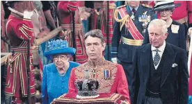  ?? Picture / AP ?? Queen Elizabeth and Prince Charles arrive for the Queen’s Speech.