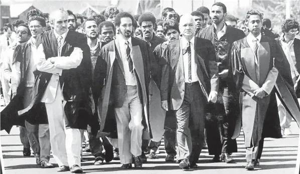  ?? Picture: Courtesy of UWC ?? IN THE VANGUARD In the turbulent 1980s, Professor Jairam Reddy of the University of the Western Cape’s dentistry faculty, far right, marched with senior UWC staff and about 4 000 students to the Bellville police station to demand the release of detained students. From left, Professor Jaap Durand, Professor Jakes Gerwel and Professor Richard van der Ross.