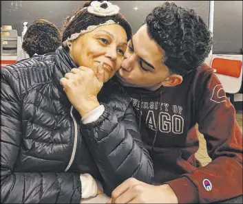  ?? The Associated Press ?? This photo provided by Cristian Padilla Romero, right, shows him kissing his mother, Tania Romero, who is currently being held in a Georgia detention center.