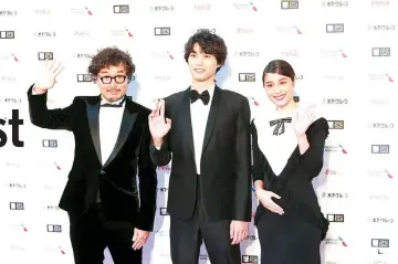  ??  ?? Cast of ‘The Travelling Cat Chronicles’ which bows out at TIFF before its release in Japan. — TIFF photo