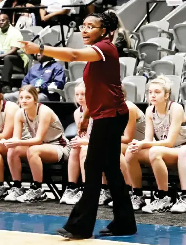  ?? ?? East Webster girls basketball coach Courtney O’briant-wright directs her team during a game last season. (Photo by Kylee Mcminn, for Starkville Daily News)