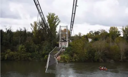  ??  ?? The collapsed bridge between Mirepoix-sur-Tarn and Bessières in the Haute-Garonne department. Photograph: Eric Cabanis/AFP via Getty Images