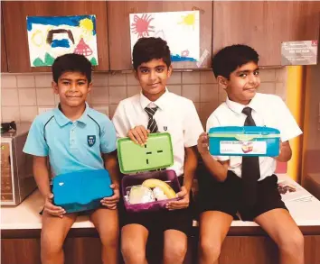  ?? Courtesy: Banerjee family ?? The three Banerjee children, ages 11, nine and six, take packed lunches to school from home.