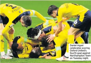  ??  ?? Daniel Agyei celebrates scoring Oxford United’s fourth goal against Northampto­n Town on Tuesday night.