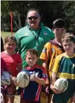  ?? PHOTO: GERARD WALSH ?? BIG LOSS: Jim Stevens (back) at a junior NRL Holiday Clinic held in Warwick.