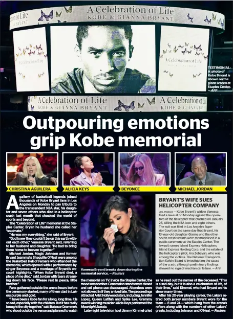  ?? Reuters — AFP ?? Vanessa Bryant breaks down during the memorial service. —
TESTIMONIA­L: A photo of Kobe Bryant is shown on the giant screen at Staples Center. CHRISTINA AGUILERA ALICIA KEYS BEYONCE MICHAEL JORDAN