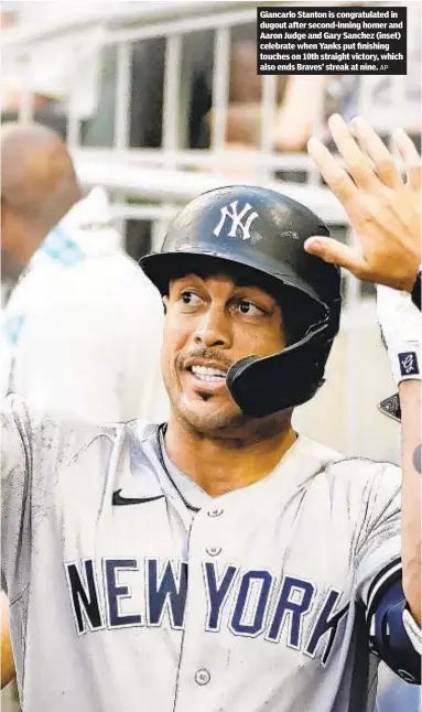  ?? AP ?? Giancarlo Stanton is congratula­ted in dugout after second-inning homer and Aaron Judge and Gary Sanchez (inset) celebrate when Yanks put finishing touches on 10th straight victory, which also ends Braves’ streak at nine.