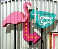  ?? COURTESY PHOTO ?? The Flamingo Springs sign is now up at the new resort, which will open in August. Artist Jason Jones created the sign for the vintage trailer resort.