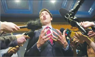  ?? CP PHOTO ?? Prime Minister Justin Trudeau responds to reporters questions after speaking at the GBC Resource Efficiency Workshop B7, as part of the G7 meeting, Thursday.