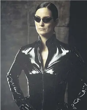  ??  ?? Carrie-Anne Moss starred in the original Matrix franchise, which was so strong that Warner Bros.’ upcoming reboot may not stand on its own.