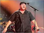  ?? LAURA ROBERTS/INVISION/AP, FILE ?? Luke Combs performs at the 2018 CMA Music Festival in June in Nashville, Tenn.