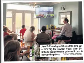  ?? CLIXX PHOTOGRAPH­Y ?? Jess Duffy and groom Louis took time out of their big day to watch Wales’ latest Six Nations clash down the pub – with Jess in her wedding dress