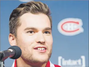  ?? CP PHOTO ?? Newly acquired Montreal Canadien Jonathan Drouin answers a question as he is introduced to the media during a press conference at the Bell Centre in Montreal on Thursday.