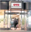  ?? BLOOMBERG ?? A person enters an Oyo hotel, operated by Oyo Hotels Japan G.K., in
Tokyo.