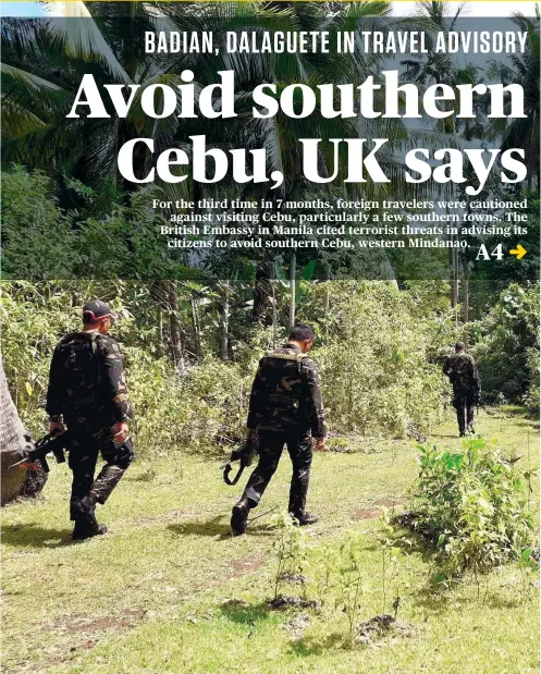  ?? FOTO COURTESY OF DAVE CHARLES RESPONTE OF DYTR BOHOL ?? CHASING THE FINAL 2. Soldiers and police check out Pangangan in Calape, Bohol, after reports that 2 Abu Sayyaf stragglers had been spotted there.