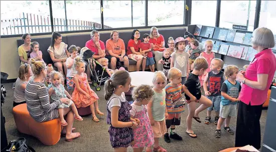  ??  ?? Move and groove: Children get up to act out a story as part of Rhyme and Storytime at the new Cobram library.