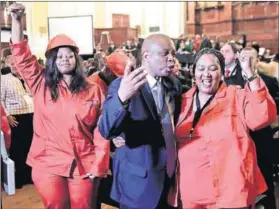  ?? Photo: Gallo Images/Daily Sun/Trevor Kunene ?? Winning partnershi­p: Johannesbu­rg mayor Herman Mashaba celebrates with EFF members.