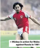  ??  ?? &gt; Mickey in action for Wales against Russia in 1981