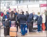  ?? (AP) ?? Passengers wait for flight informatio­n at the Brussels Airport in Zaventem, Belgium on Feb 13. Belgium’s air traffic control authority shut down the country’s airspace for 24 hours due to staffing uncertaint­ies caused by a nationwide strike on Wednesday.