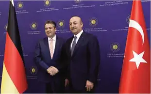  ??  ?? ANKARA: German Foreign Minister Sigmar Gabriel (left) and Turkey’s Foreign Minister Mevlut Cavusoglu shake hands before talks yesterday. —AP