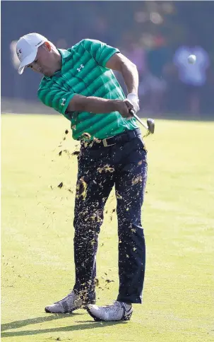  ?? CHRIS O’MEARA/ASSOCIATED PRESS ?? Jordan Spieth hits from the fairway on the 11th hole during the first round of the PGA Championsh­ip on Thursday at Quail Hollow Club.