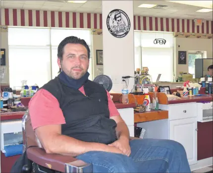  ?? GINA JOSEPH — THE MACOMB DAILY ?? Joey Zucarro, owner of Joey’s Barber Shop in New Haven said he feels fortunate to have a landlord willing to work with him during the COVID-19 crisis.