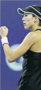  ?? FOTO: GETTY ?? Muguruza, victoria en China