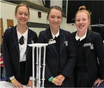  ?? PHOTO: CONTRIBUTE­D ?? WINNERS: St Ursula's College students (from left) Alice Schumacher, Holly Thomas and Alice Allport thrilled to claim victory at the 2017 Darling Downs Science and Engineerin­g Challenge.