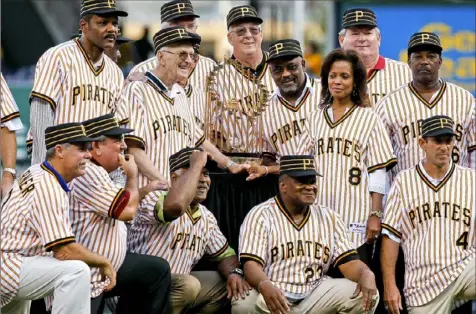  ?? Associated Press ?? A look back at some of the members of the 1979 team who returned to PNC Park in 2009 for the 30th anniversar­y of their World Series championsh­ip: From left to right, top row, Omar Moreno, Bruce Kison ( partially blocked by Chuck Tanner), Kent Tekulve, Bill Madlock, Margaret Stargell, the wife of the late Willie Stargell, Don Robinson and Rennie Stennett. Bottom row, left to right, are Phil Garner, Steve Nicosia, Grant Jackson, Mike Easler and Dale Berra. Tanner and Kison have died since that gathering.