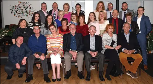  ?? Photo by Michelle Cooper Galvin ?? Rick and Ray Sheehy of The Bianconi Inn (seated centre) at their retirement dinner with family and staff members Arek Kolodzej, John Foley, Carmel Sheehy, Celine and Jack (centre row from left) Helen Burke, Rachel Taylor, Eileen Brennan, Noreen...