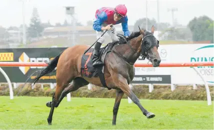  ?? Trish Dunell ?? Lizzie L’Amour wins the Gr 1 Herbie Dyke Stakes at Te Rapa yesterday.