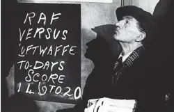  ??  ?? A newspaper vendor watches a dogfight over London, while keeping a tally of RAF and Luftwaffe losses, c1940