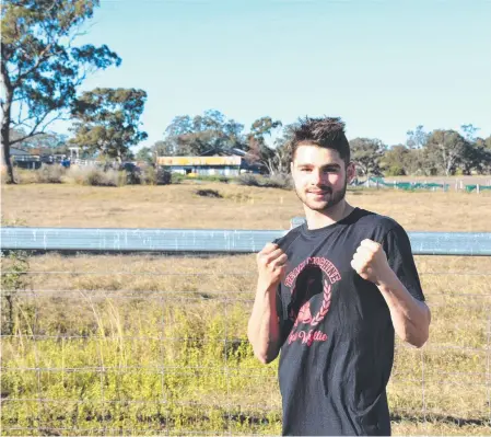  ?? Picture: Emily Clooney ?? KEEN TO FIGHT: Warwick boxer Jake Wyllie is ready for his profession­al debut on July 11 on the Locked Down Lights Up card at Smithy’s TGW Gym.