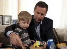  ?? ADRIAN WYLD/THE CANADIAN PRESS ?? Premier Dalton Mcguinty plays with Rowan Henderson, 2, at an event at an Ottawa home Friday. The premier needs NDP help to pass the budget.