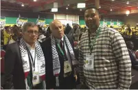  ?? (Supplied Zaid Nordien) ?? PALESTINIA­N AUTHORITY members Majed Al-Fetyani and Jibril Rajoub (center) pose with Nelson Mandela’s grandson Mandla Mandela on Saturday at the ANC National Conference in Johannesbu­rg.